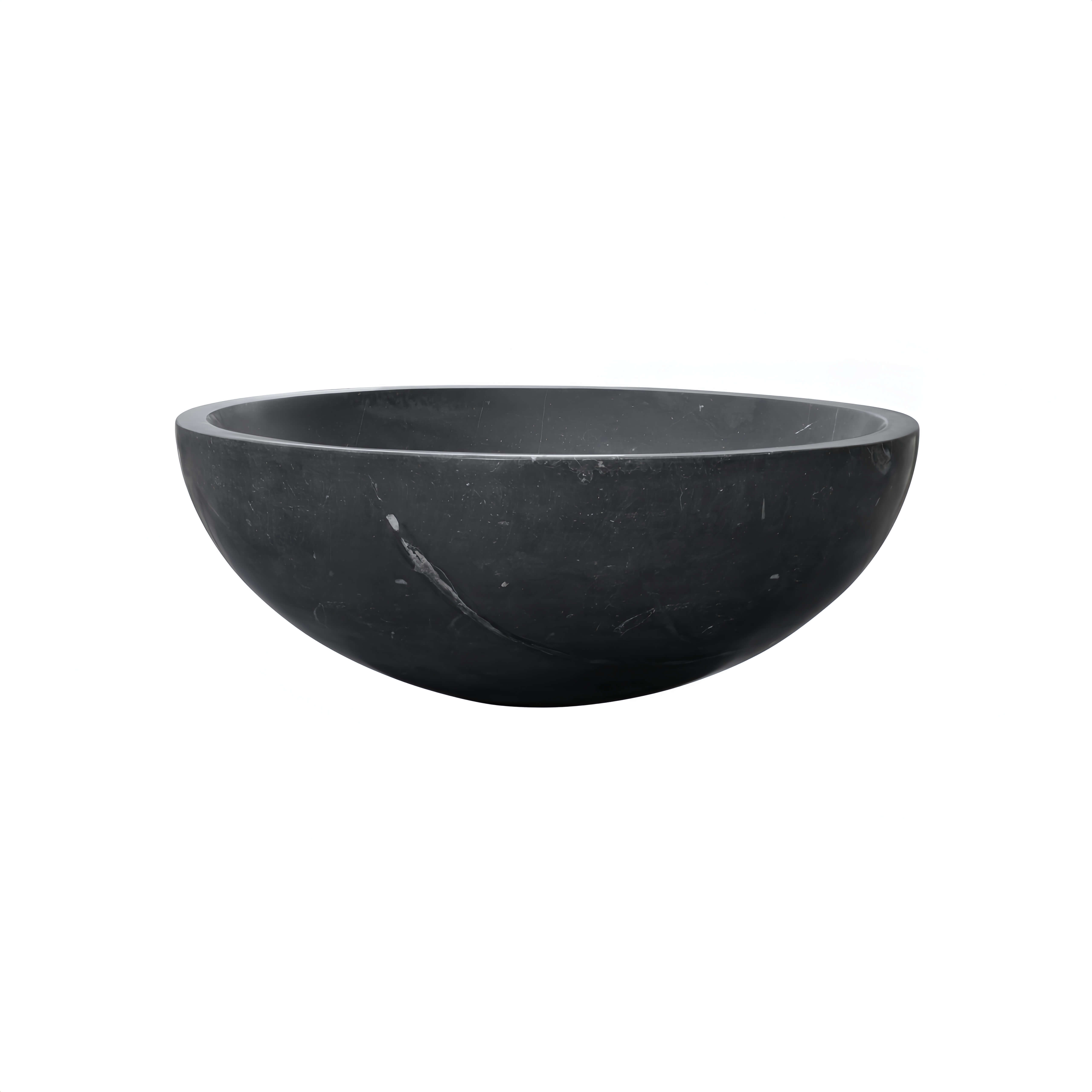 Side profile of one-piece carved black marble vessel sink, showing 150mm bowl depth and continuous veining along the exterior wall.