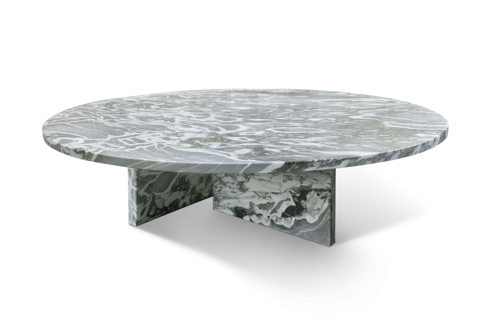 Round cloudy blue marble coffee table with polished finish and T-shaped marble base, 45-degree hero view.