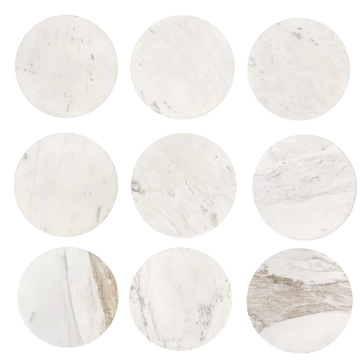 Nine tabletop veining samples: white marble with fine gray veining to warm brown tones, showing natural variation across individual units of the round marble coffee table.