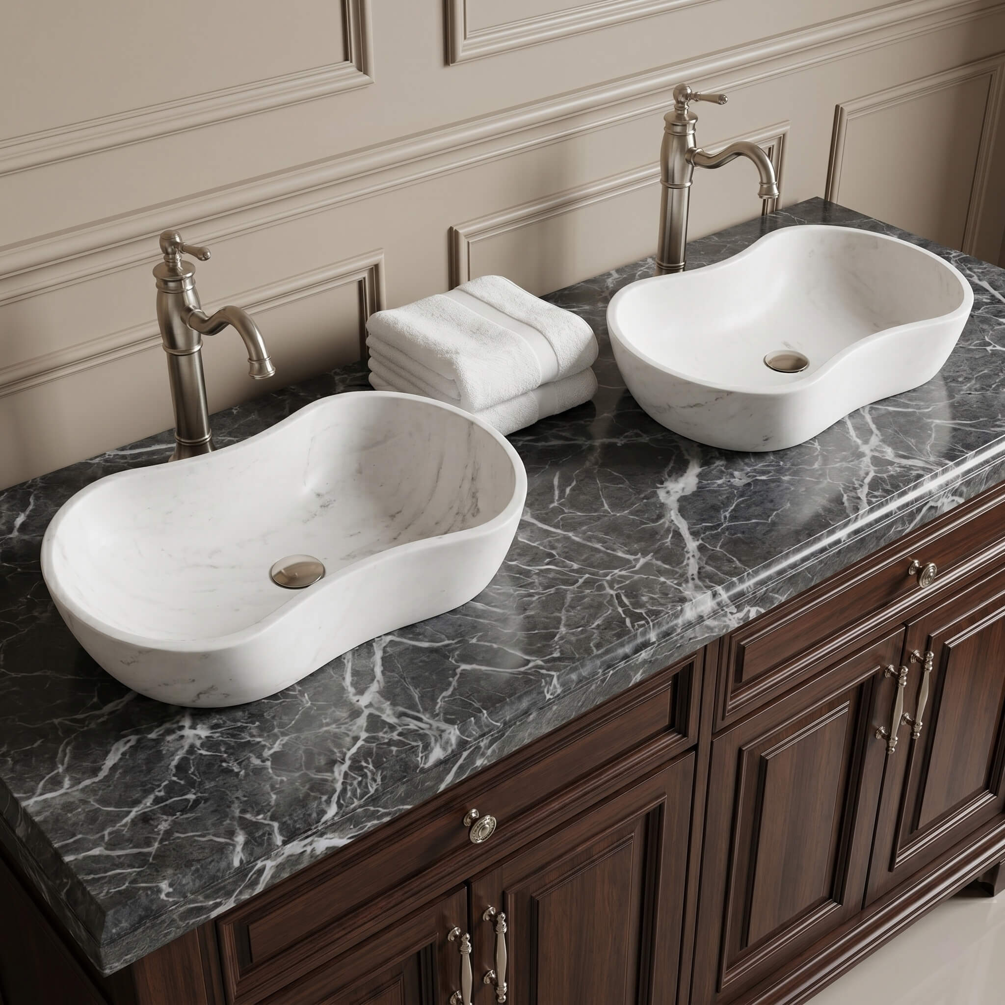 Two Snow Mountain White wavy marble vessel sinks with a honed finish installed on a dark gray veined marble vanity top with brushed nickel faucets in a classic American style master bathroom.