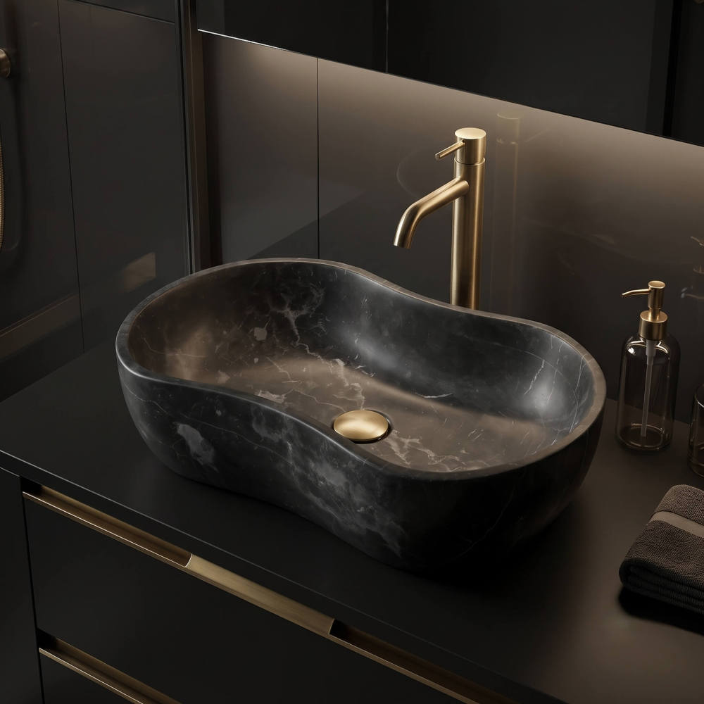 Sleek contemporary bathroom vanity setup with an Olive Black natural marble wave sink resting on a matte black cabinet with brass details.