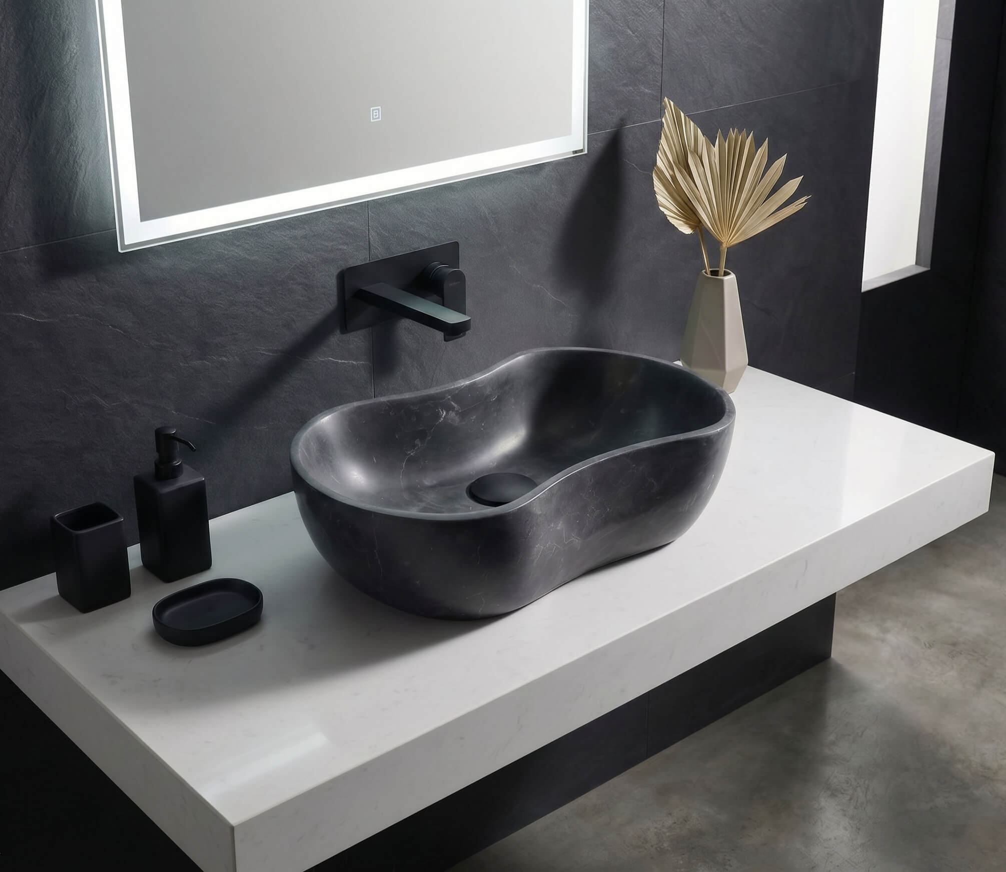 Modern bathroom design showcasing a single Olive Black marble wave vessel sink on a white quartz floating countertop with black matte fixtures.