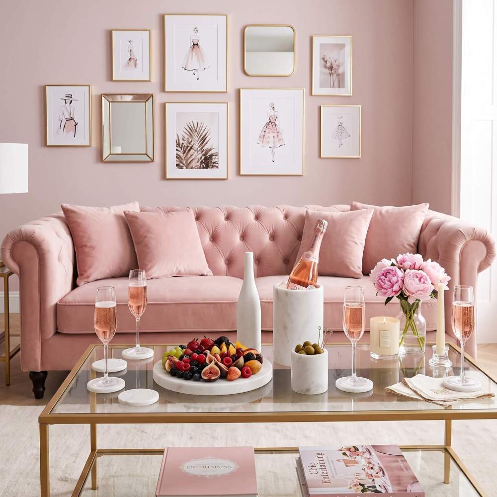 Snow Mountain White marble 10pc set on glass coffee table with pink velvet sofa in background.