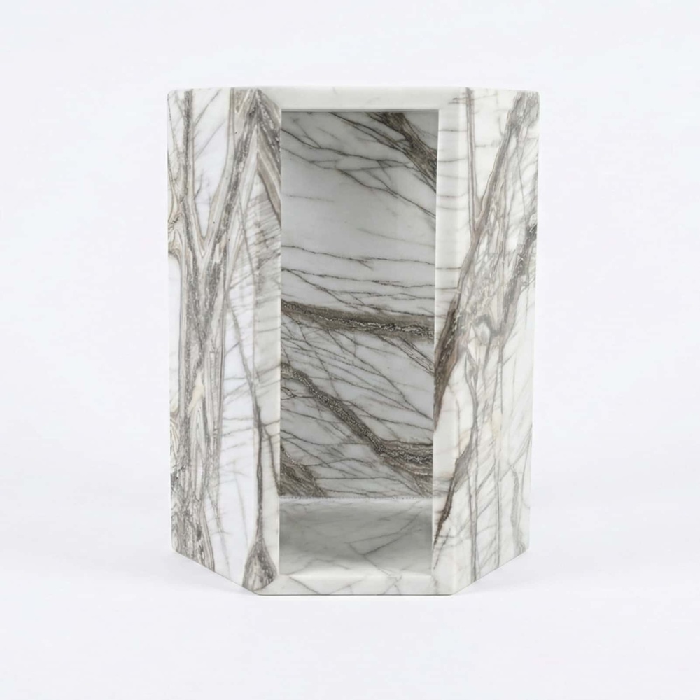 Arboris White natural marble pedestal nightstand showcasing open interior passthrough and dark veining.