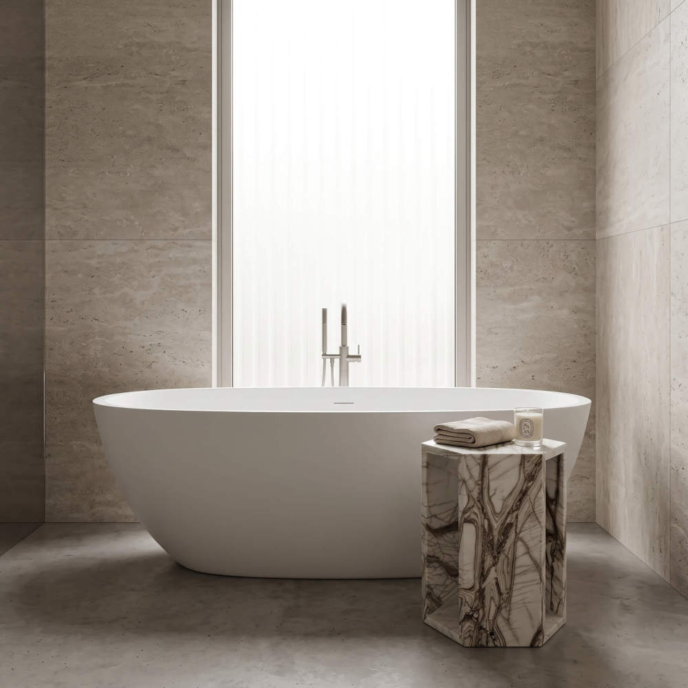 Arboris White marble hexagon drink table next to a freestanding bathtub in a stone spa bathroom.
