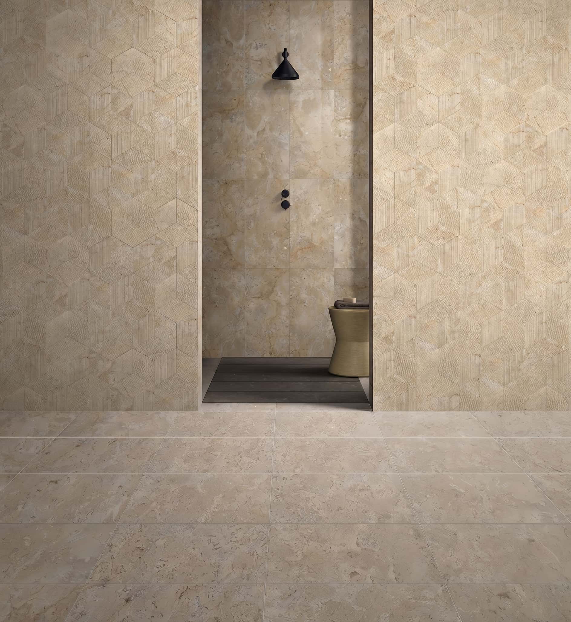 Walk-in shower with Amber Gold 3D fluted hexagon side wall tiles paired with Amber Gold 12x24 honed tiles on back wall.