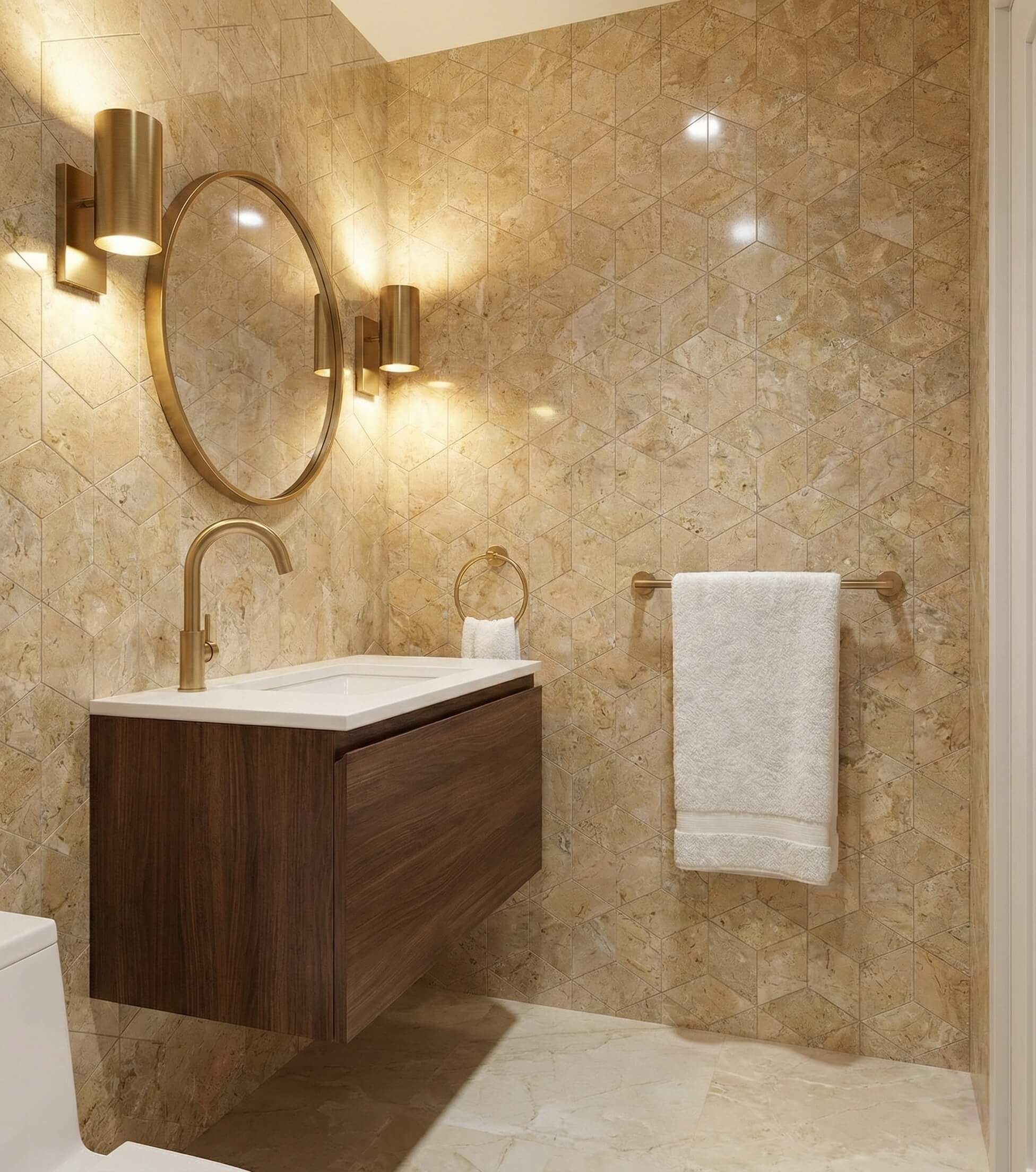 Luxury bathroom vanity wall clad in polished Amber Gold marble hexagon tiles with a floating walnut cabinet and gold mirror.