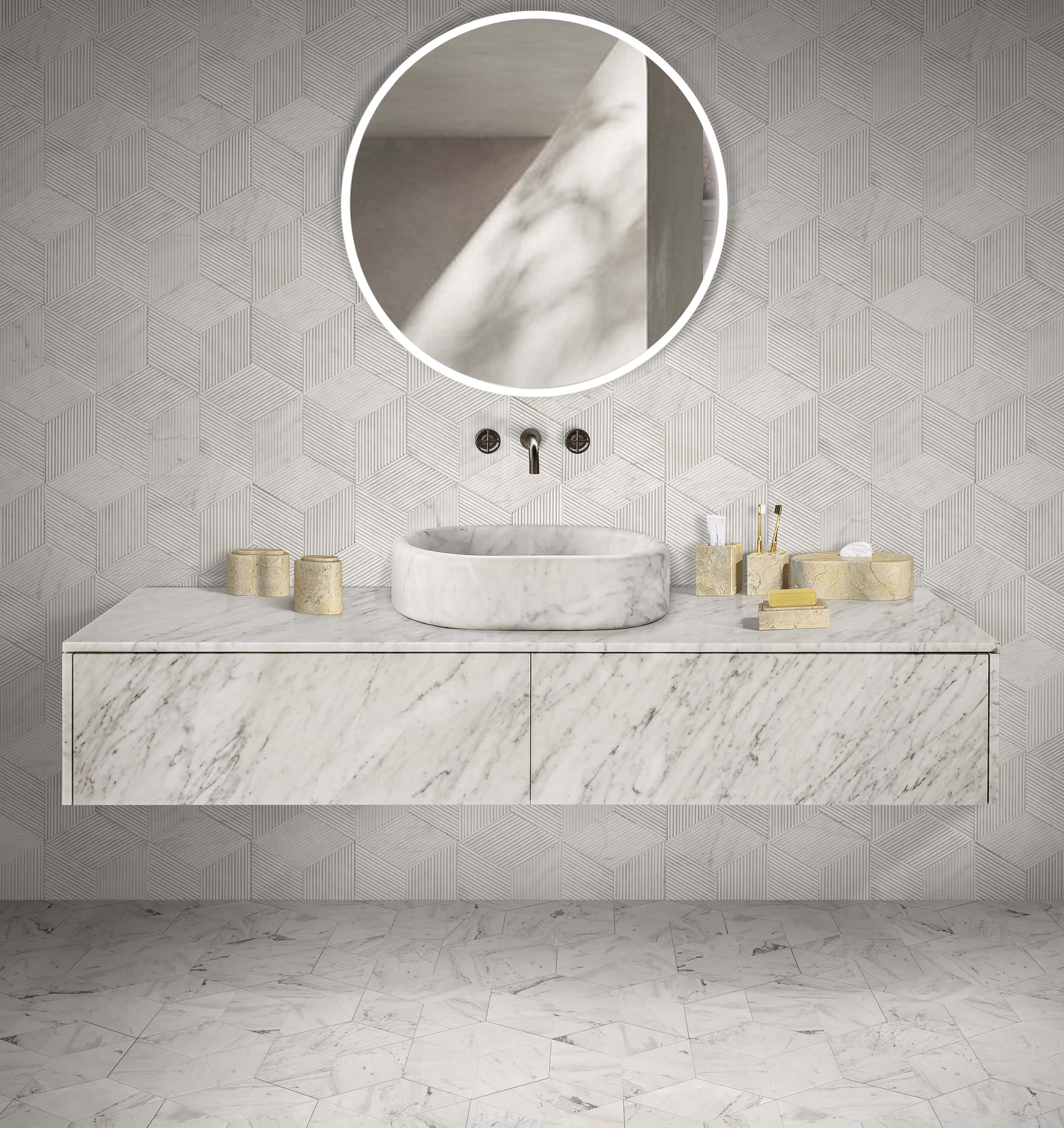 Amber gold marble set on floating vanity paired with Snow Mountain White hexagon wall tiles and an oval sink.