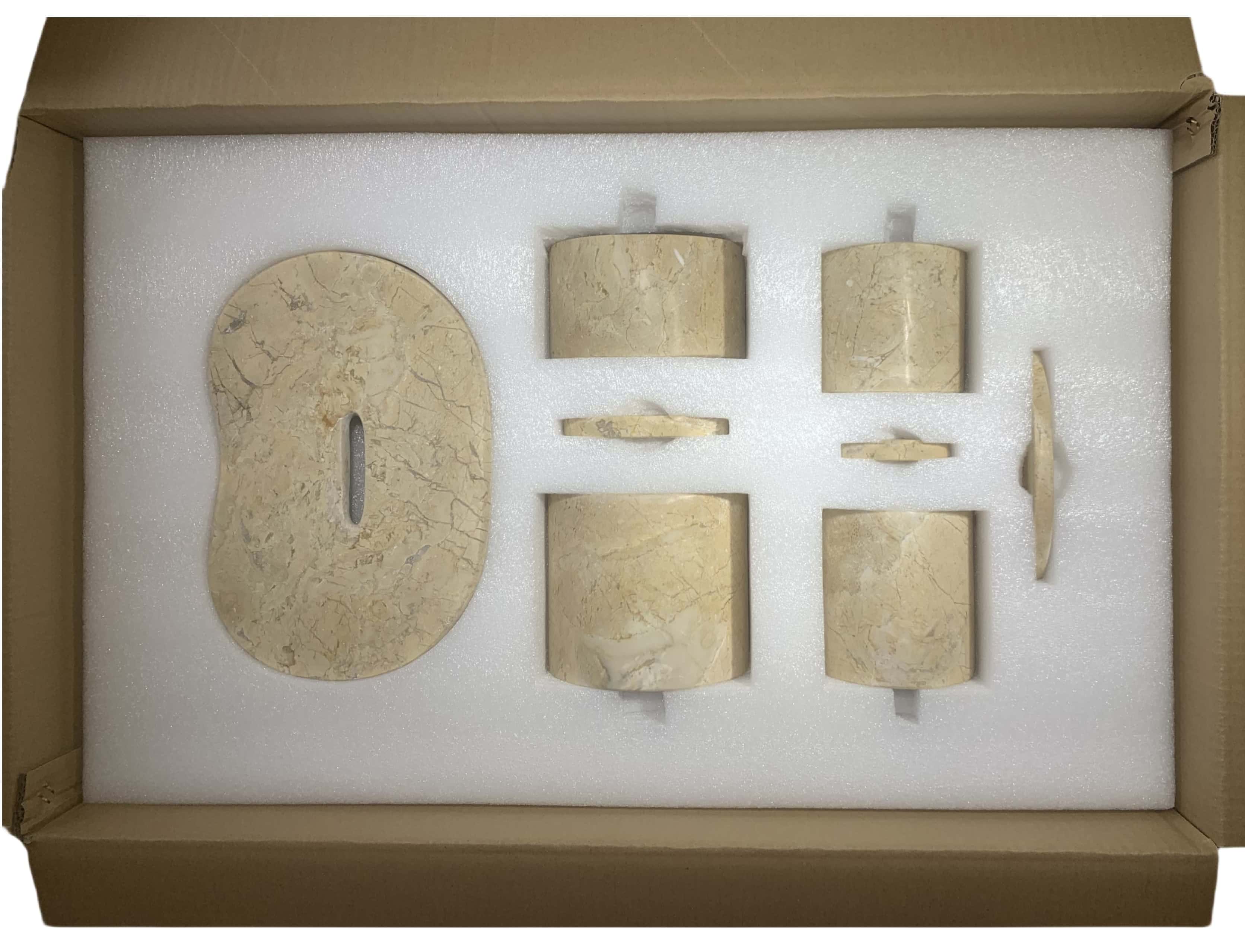 Custom protective high-density foam packaging inside a carton box protecting the Amber Gold Wave marble accessory set.