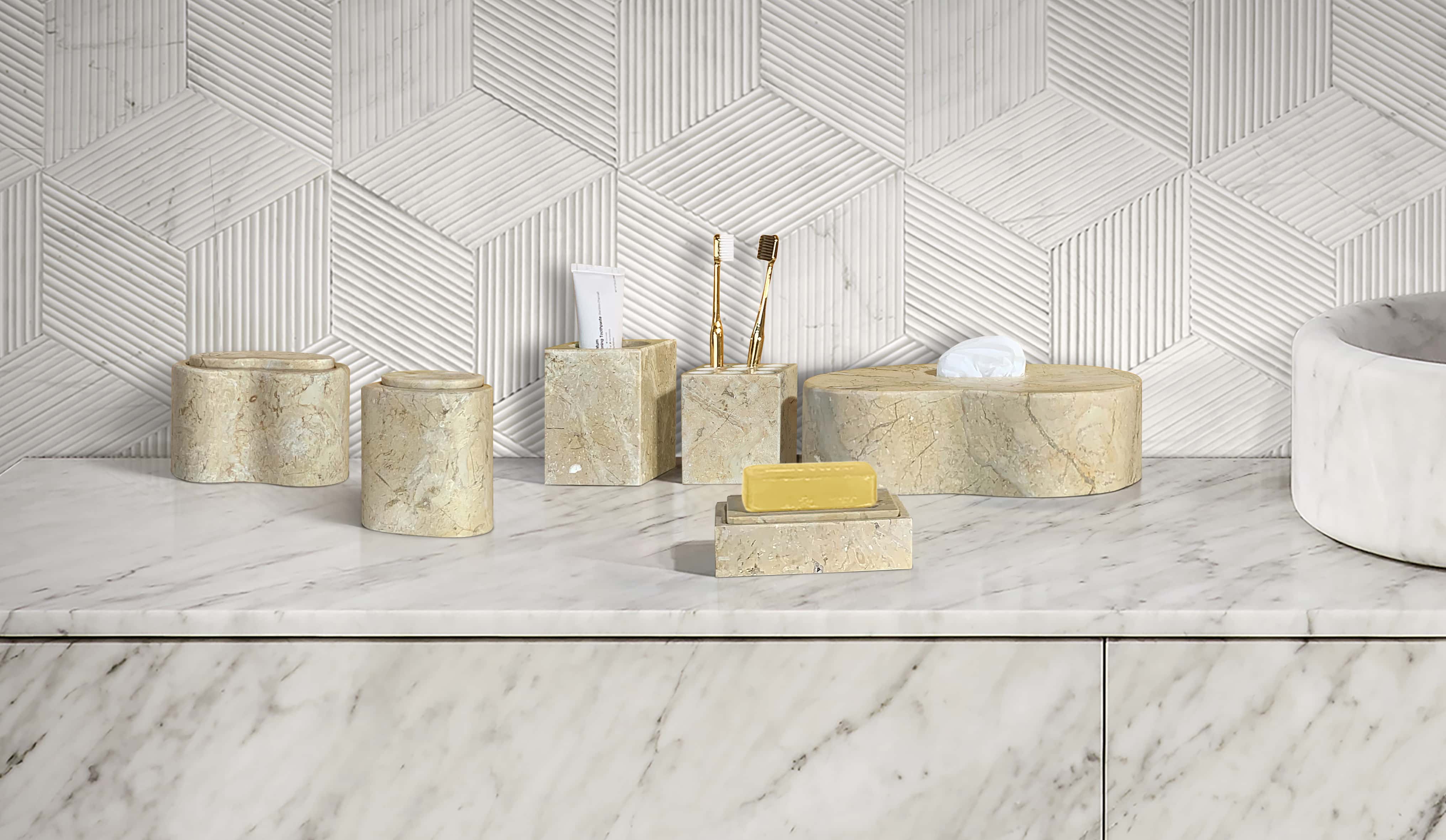 Close-up view of the Amber Gold Square style natural marble 6-piece vanity set resting on a white polished countertop.