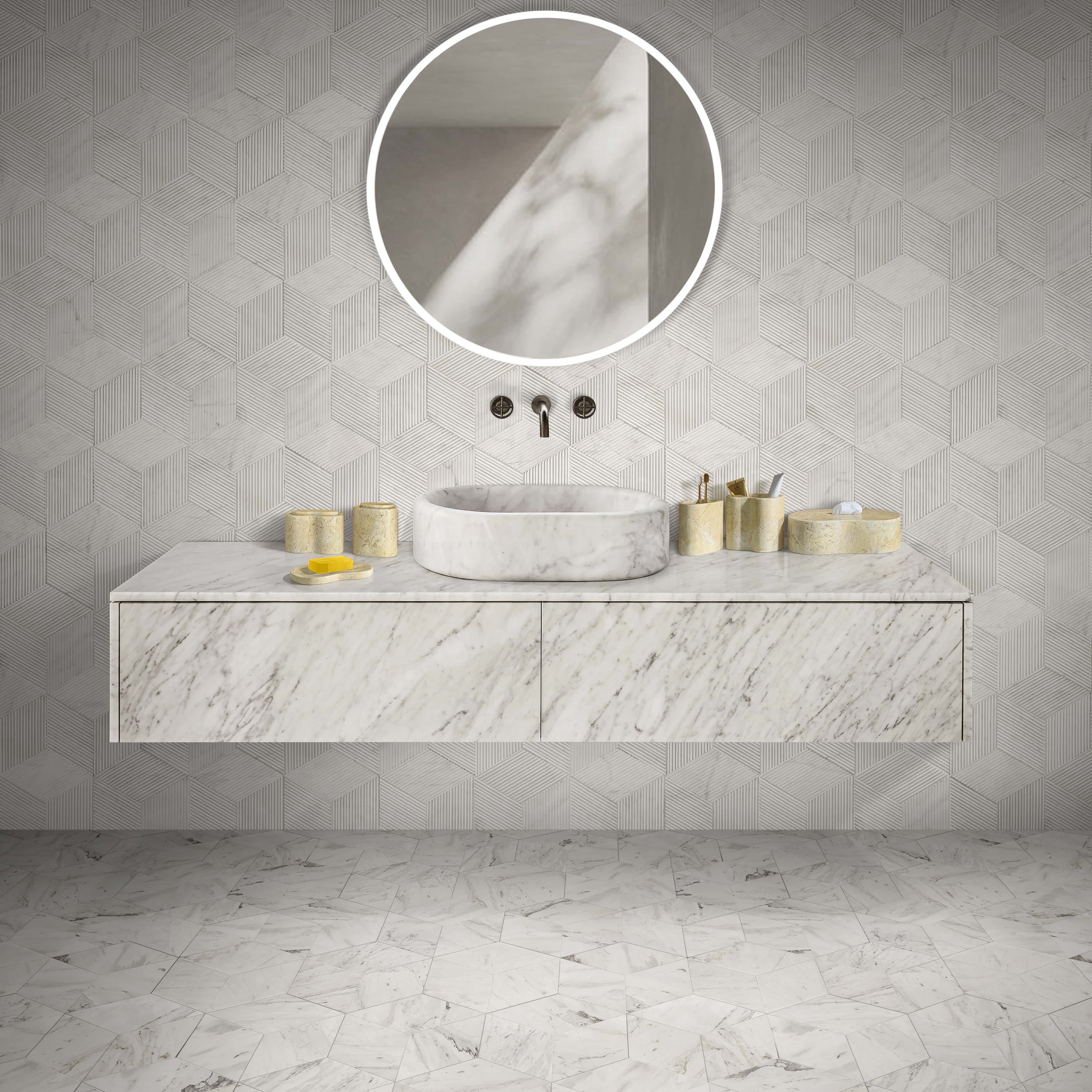 Amber Gold Wave natural marble bathroom set styled with a Snow Mountain White vessel sink and white hexagon wall tiles.