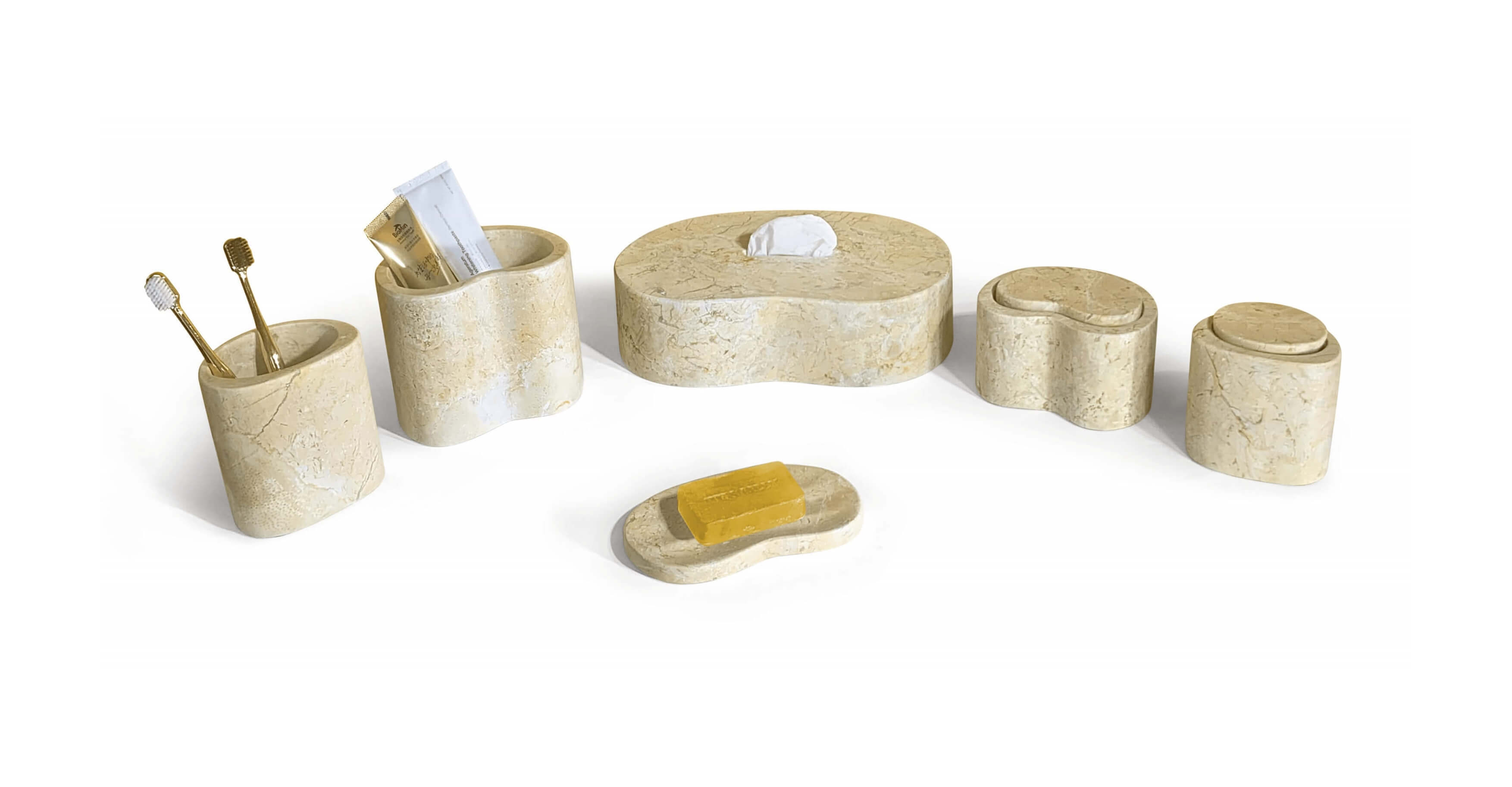 High-angle top view of a styled Amber Gold natural marble Wave 6-piece vanity set holding bar soap and tissue paper.