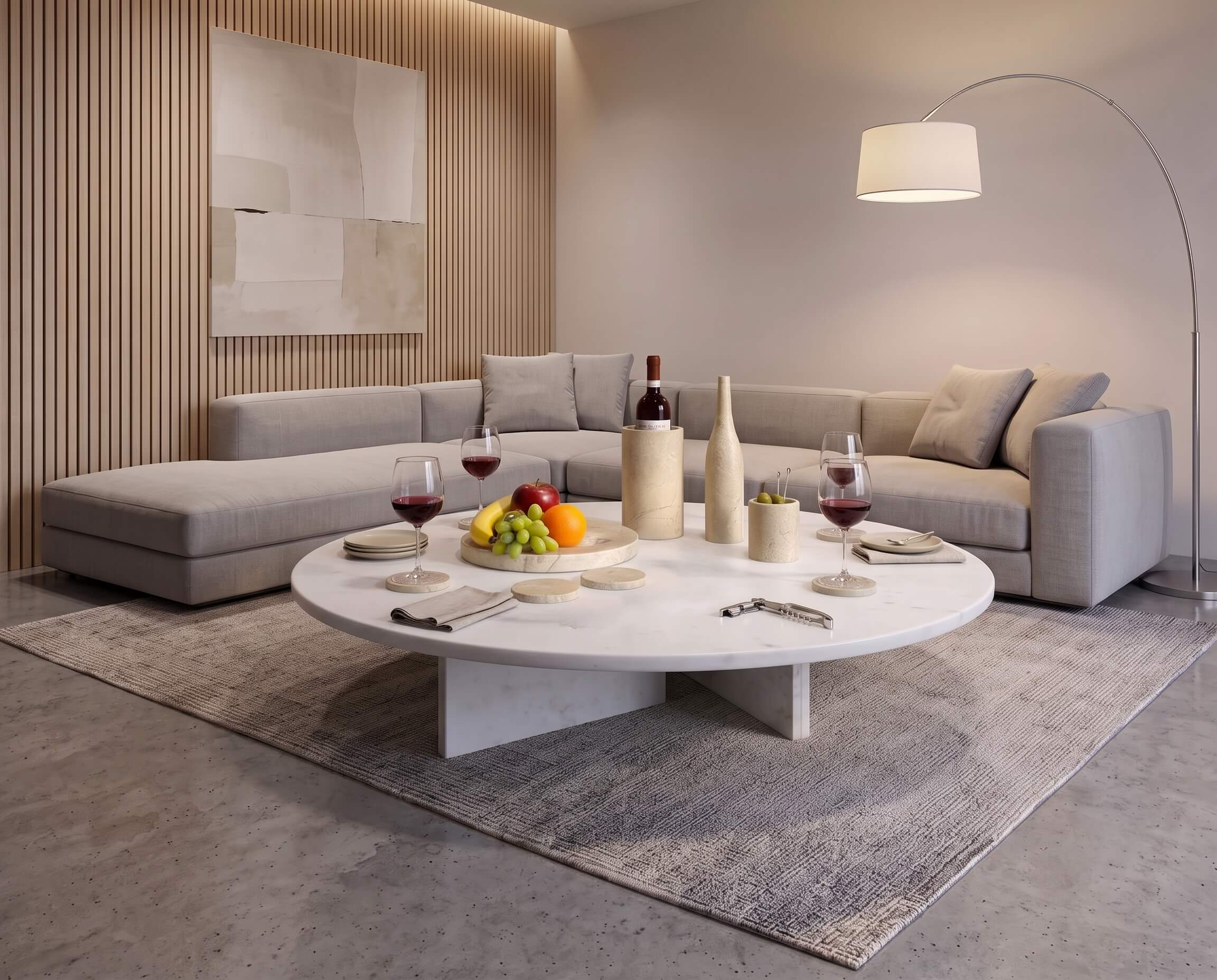 Amber Gold natural marble 10-piece set styled on a Snow Mountain White marble round coffee table in a living room.