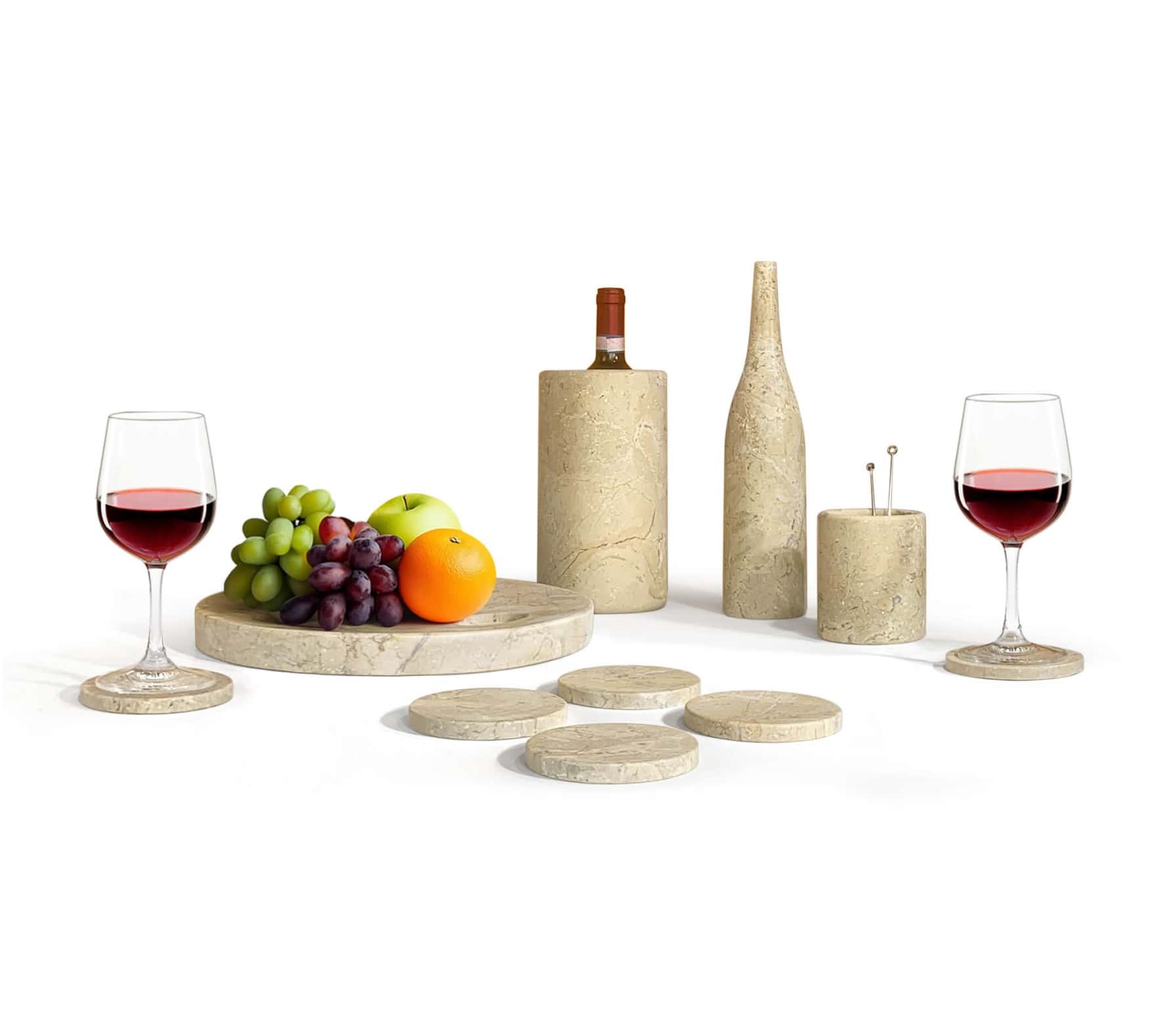 Honed Amber Gold natural marble 10-piece dining set styled on white background with wine glasses and fresh fruit props.