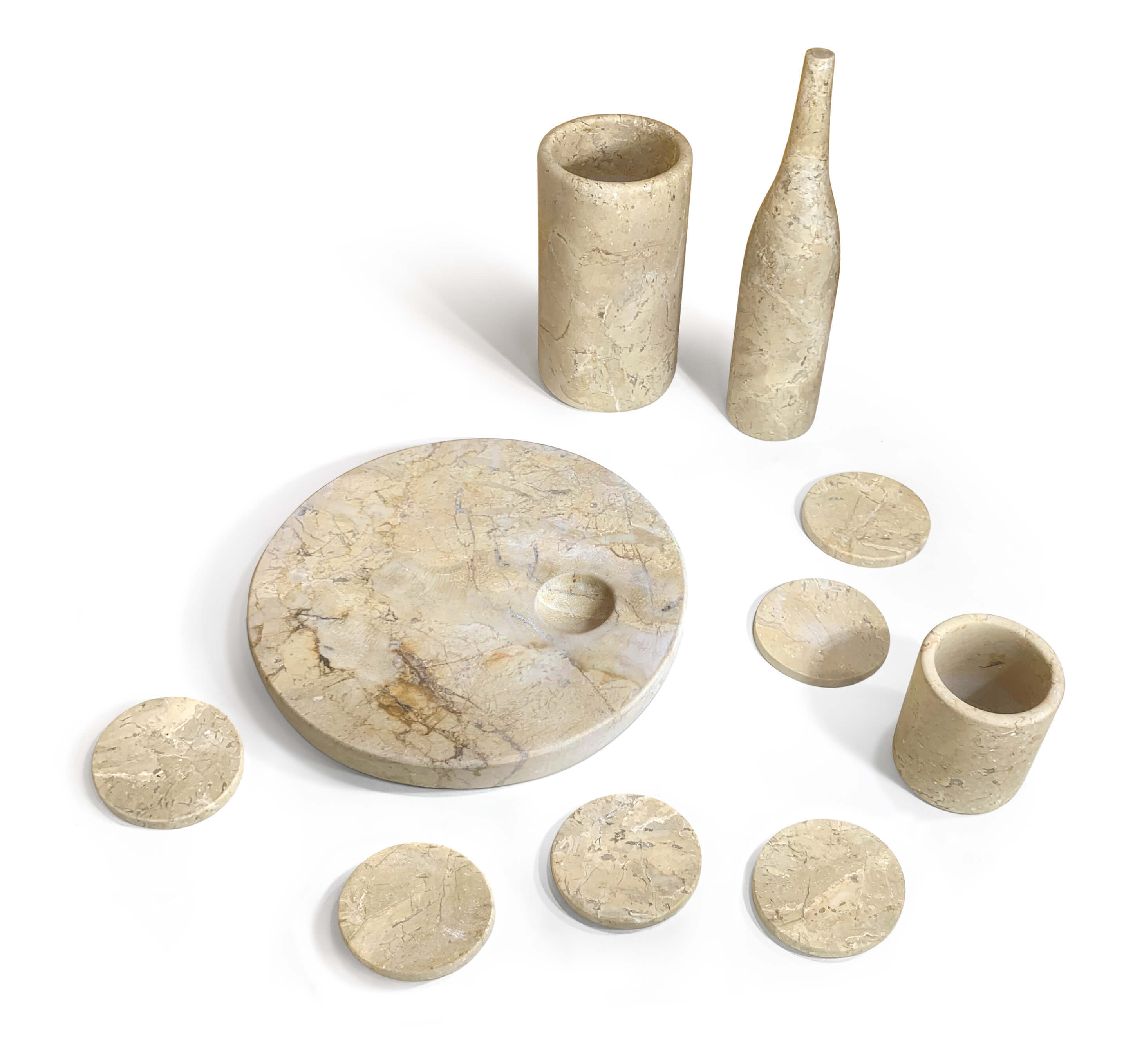 Top-down view of the complete 10-piece Amber Gold natural marble tabletop set featuring a smooth matte honed finish.