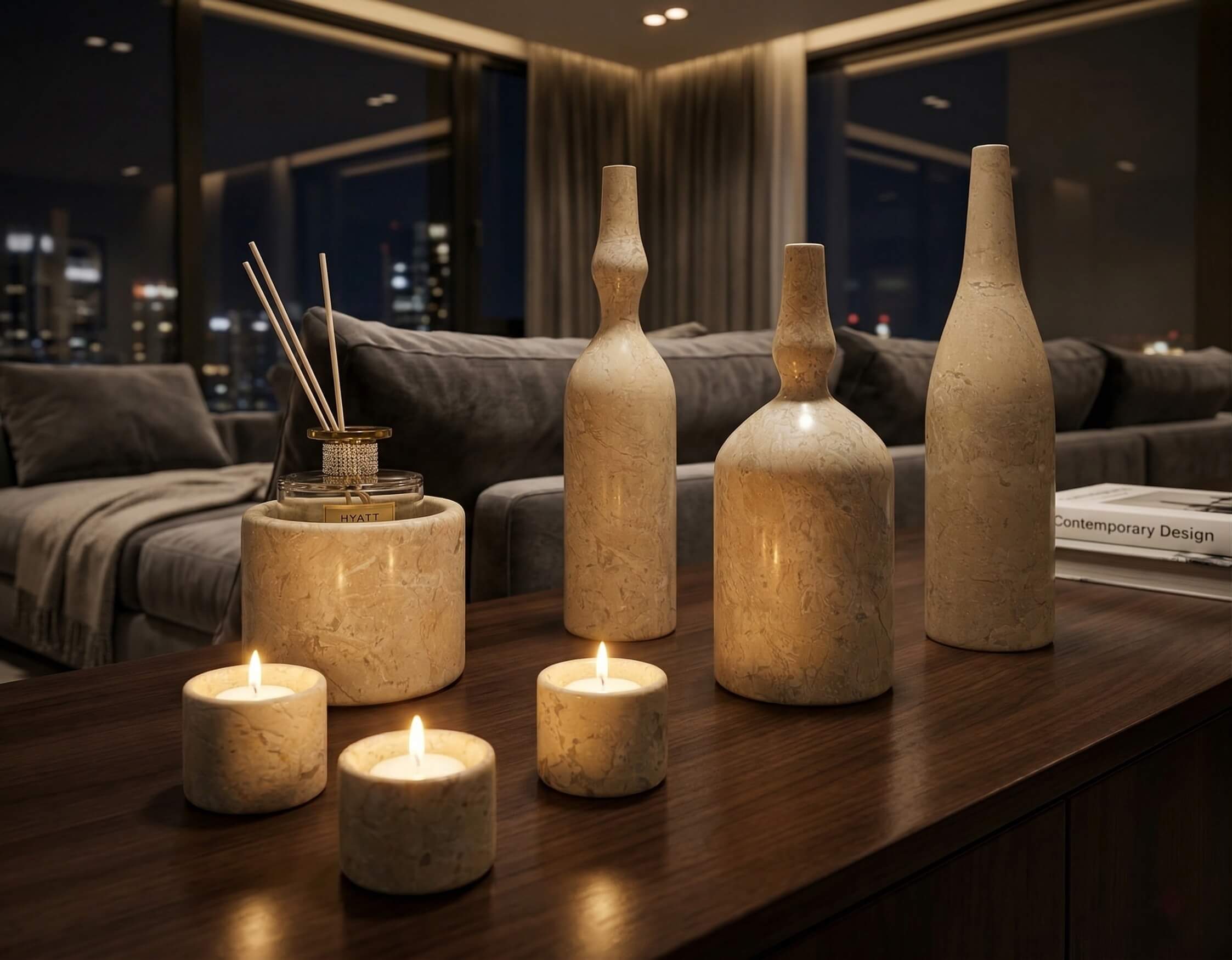 Amber Gold natural marble seven-piece decor set styled on a dark wood console table with candles in a cozy living room.