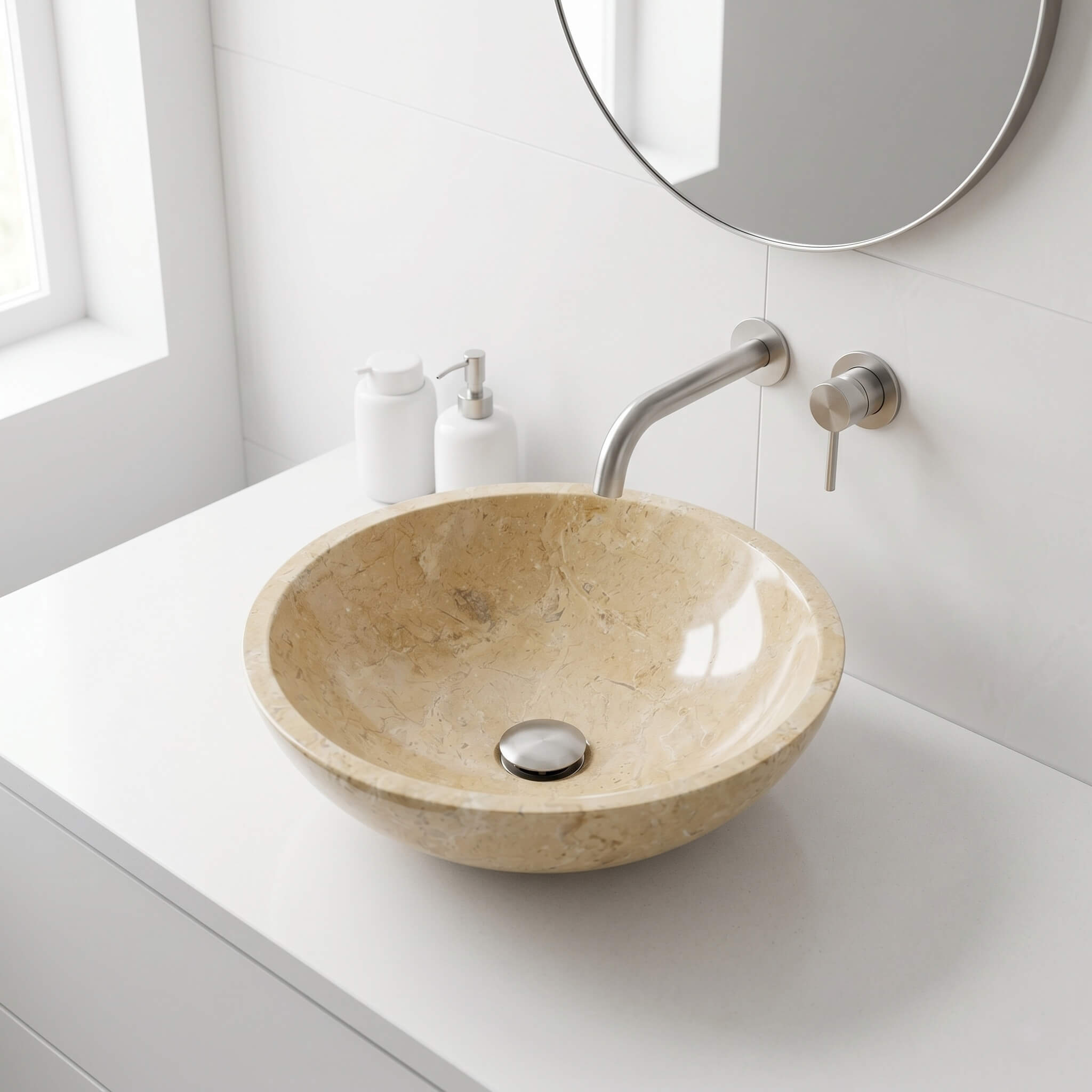 Amber Gold marble round vessel sink on white countertop with brushed nickel wall-mounted faucet in minimalist Scandinavian bathroom.
