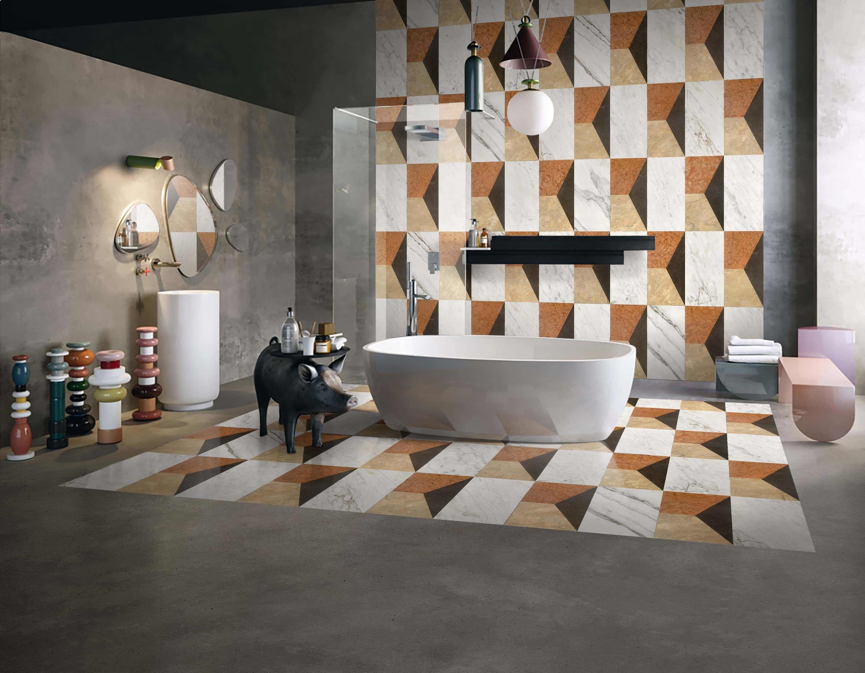 Eclectic luxury bathroom showing a white soaking tub backed by a 12x24 four-color waterjet marble tile feature wall.