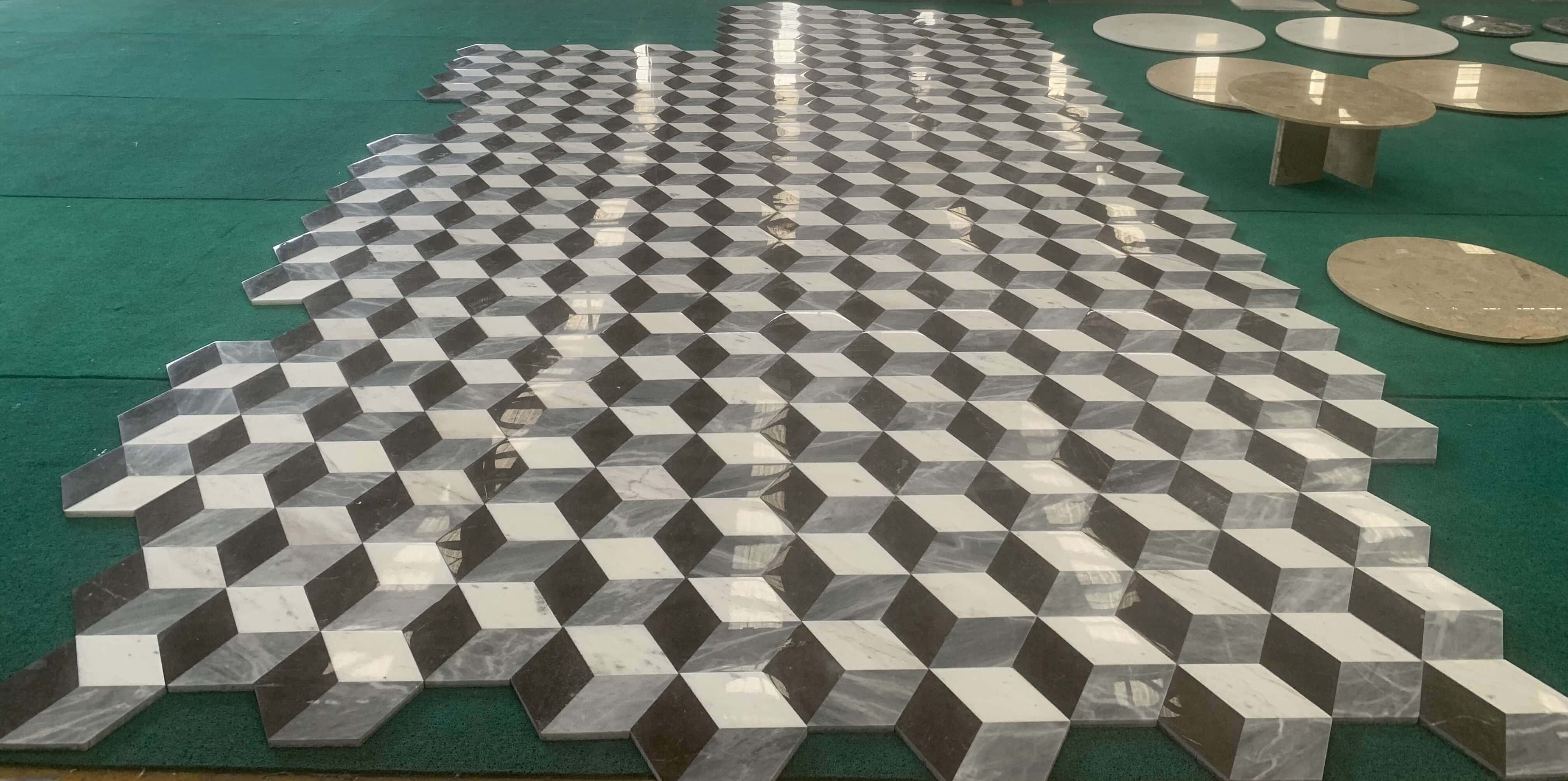 Side angle view highlighting the exquisite polished glossy finish of the 100% natural white and gray marble tile layout.