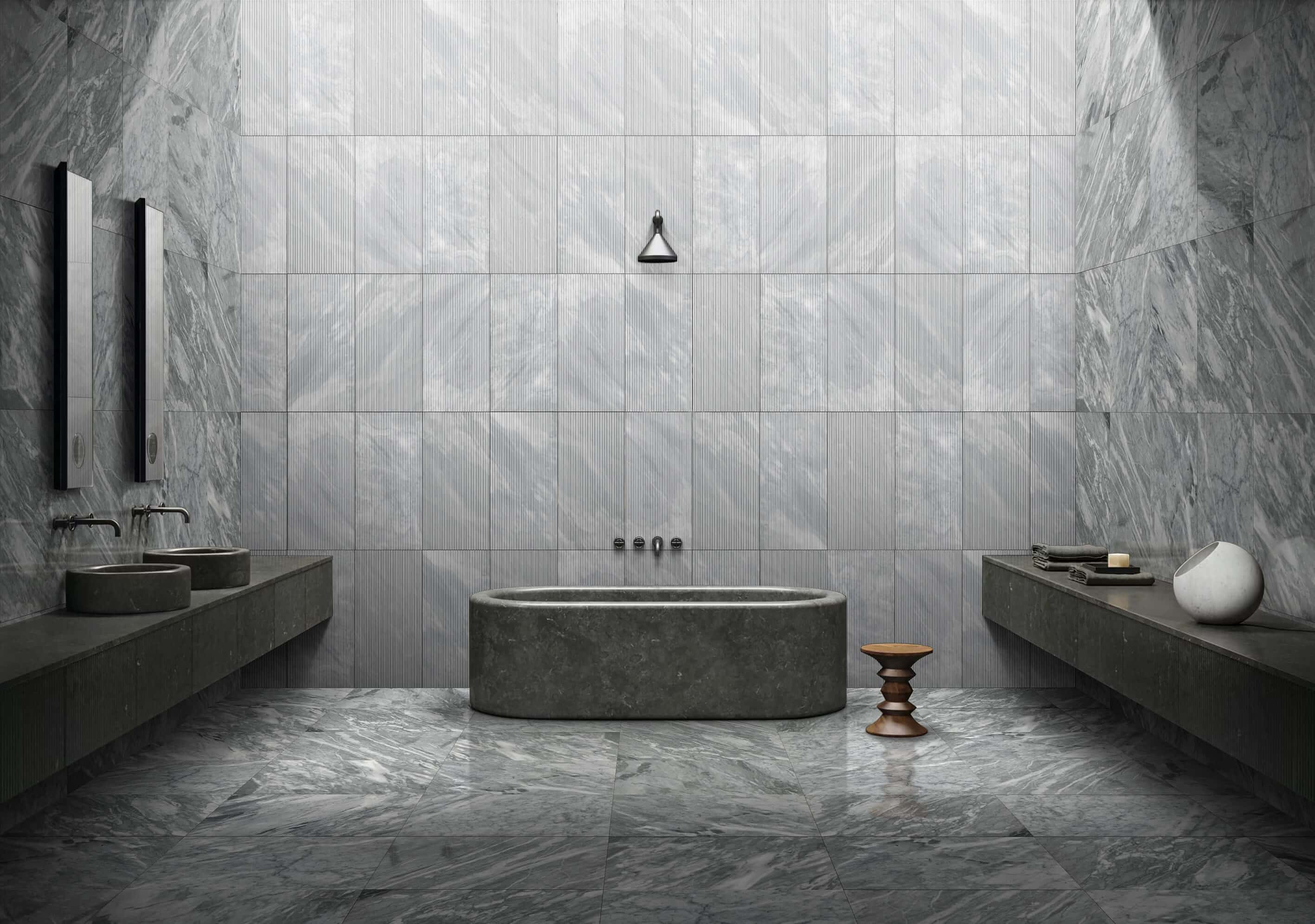 Modern bath featuring 12x24 Carrara Gray polished floor and side walls combined with fluted center wall marble tiles.