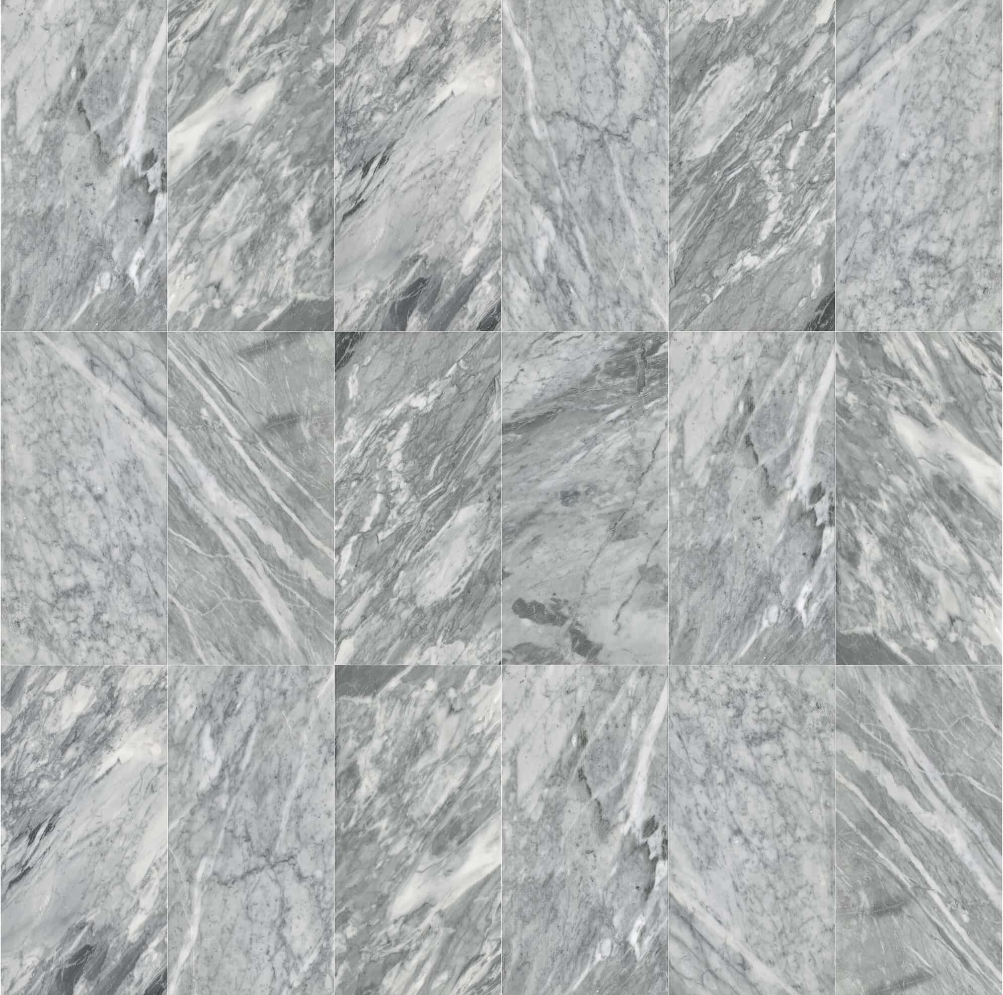 Seamless grid layout of 12x24 Carrara Gray polished marble tiles showcasing natural tone and veining variations across wall.