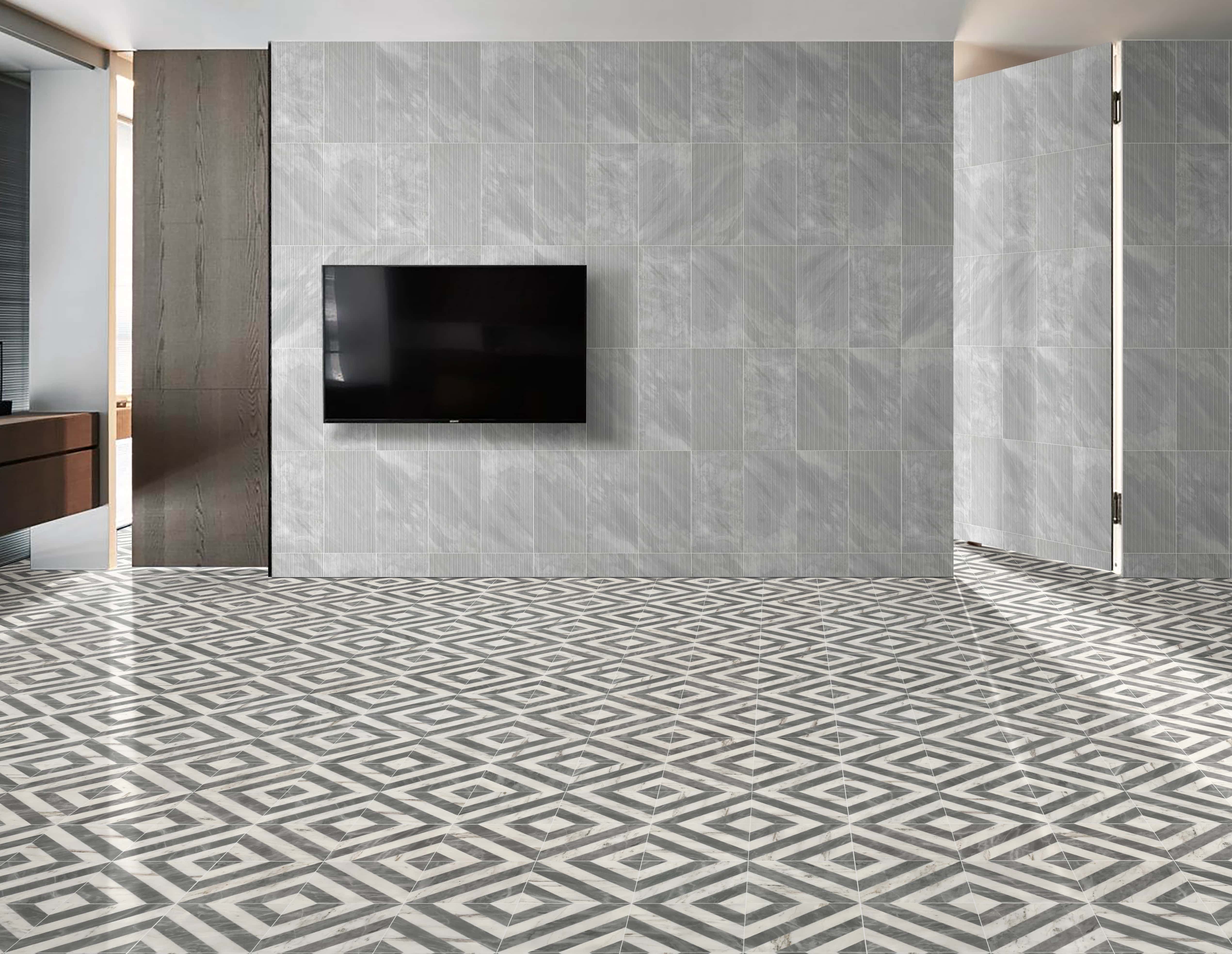 Modern interior floor in waterjet marble paired with a feature wall of 12x24 Carrara Gray OL textured marble tile.