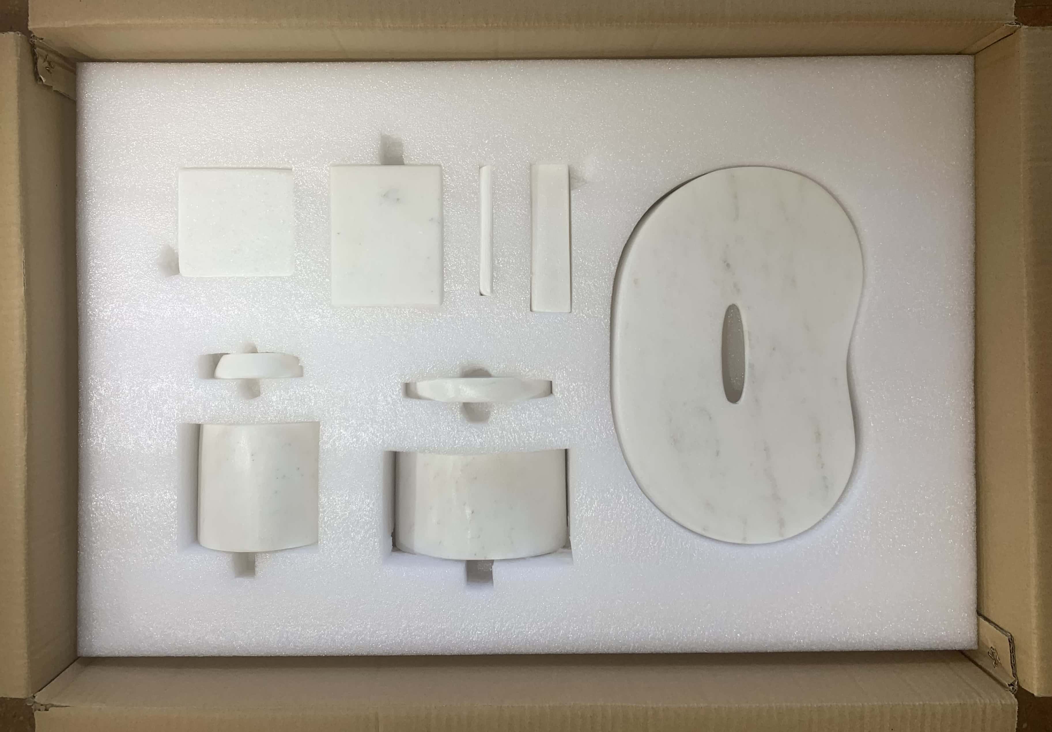 Damage-proof shipping box with custom thick foam insert protecting 6-piece Snow Mountain White marble Square Style set.