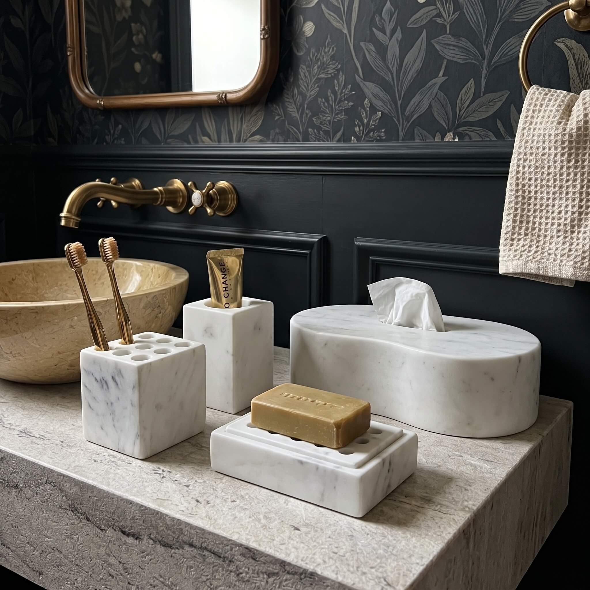 Snow Mountain White marble Square Style bath pieces on a stone counter paired with an Amber Gold polished round vessel sink.