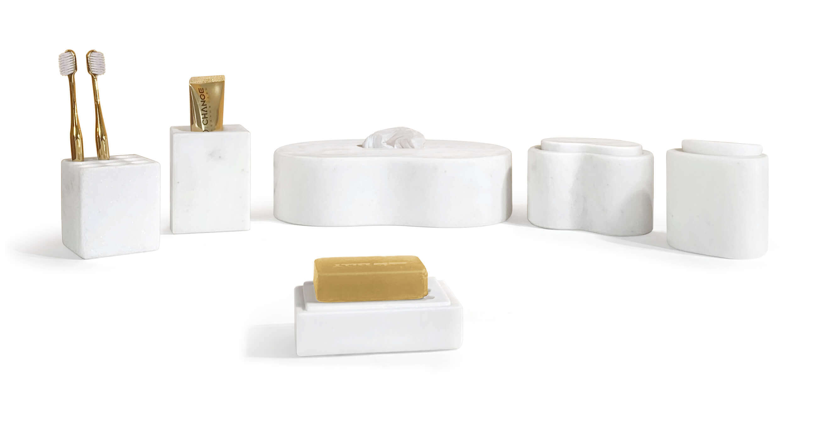 Styled 6-piece Snow Mountain White natural marble bathroom set in Square Style holding toothbrushes, tube, and bar soap.