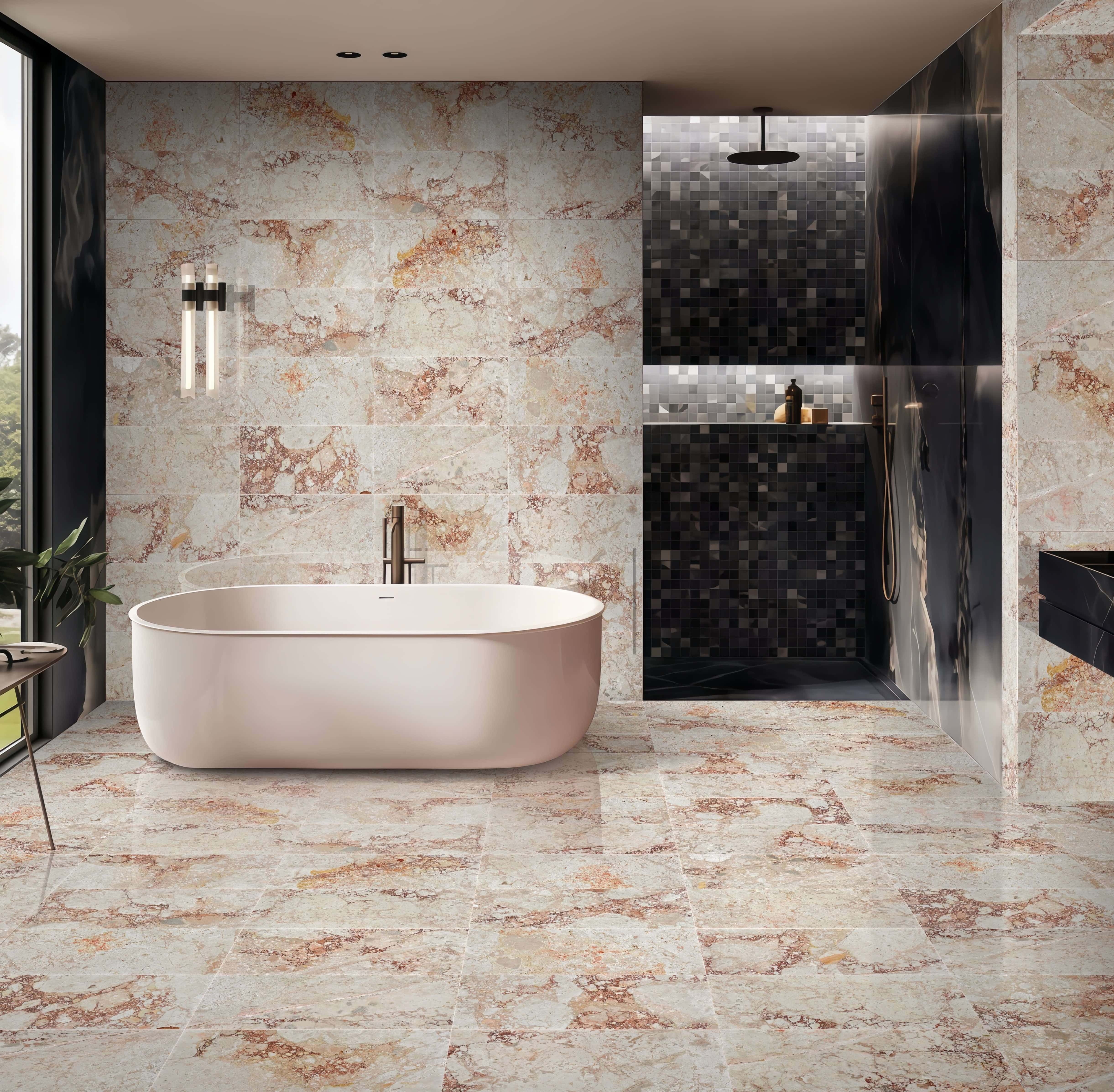 12x24 Diamond Pink natural stone bathroom tile on walls and floors behind a freestanding soaking tub in a luxury bath.