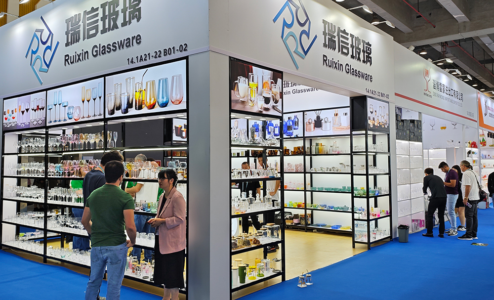 Wide view of the bustling exhibition hall stand