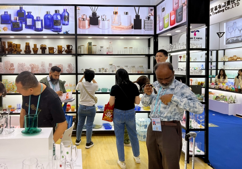 Company representatives in discussion with attendees