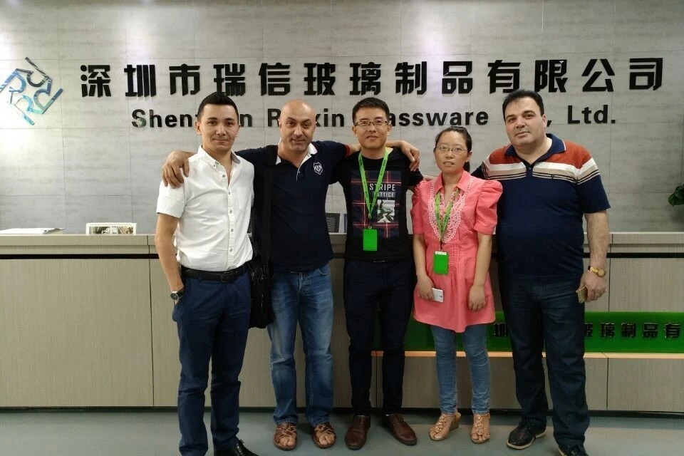 Customers examining product samples in our factory