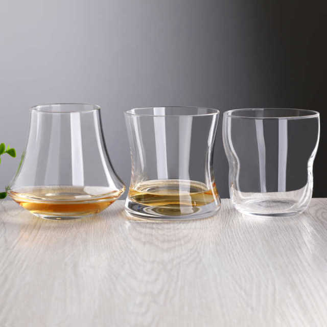 Custom Logo Rocking Tilted Whiskey Cocktail Tumbler Unique Shape Heavy Base Wholesale Corporate Gift Set Manufacturer,Fabricante Mayorista de Artículos de Vidrio y Tarros de Vela Personalizados | Ruixin Glass,Custom Logo Rocking Tilted Whiskey Cocktail Tumbler Unique Shape Heavy Base Wholesale Corporate Gift Set Manufacturer