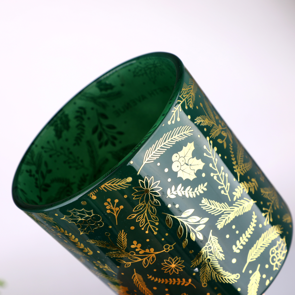Gold foil printing detail on glass candle jar