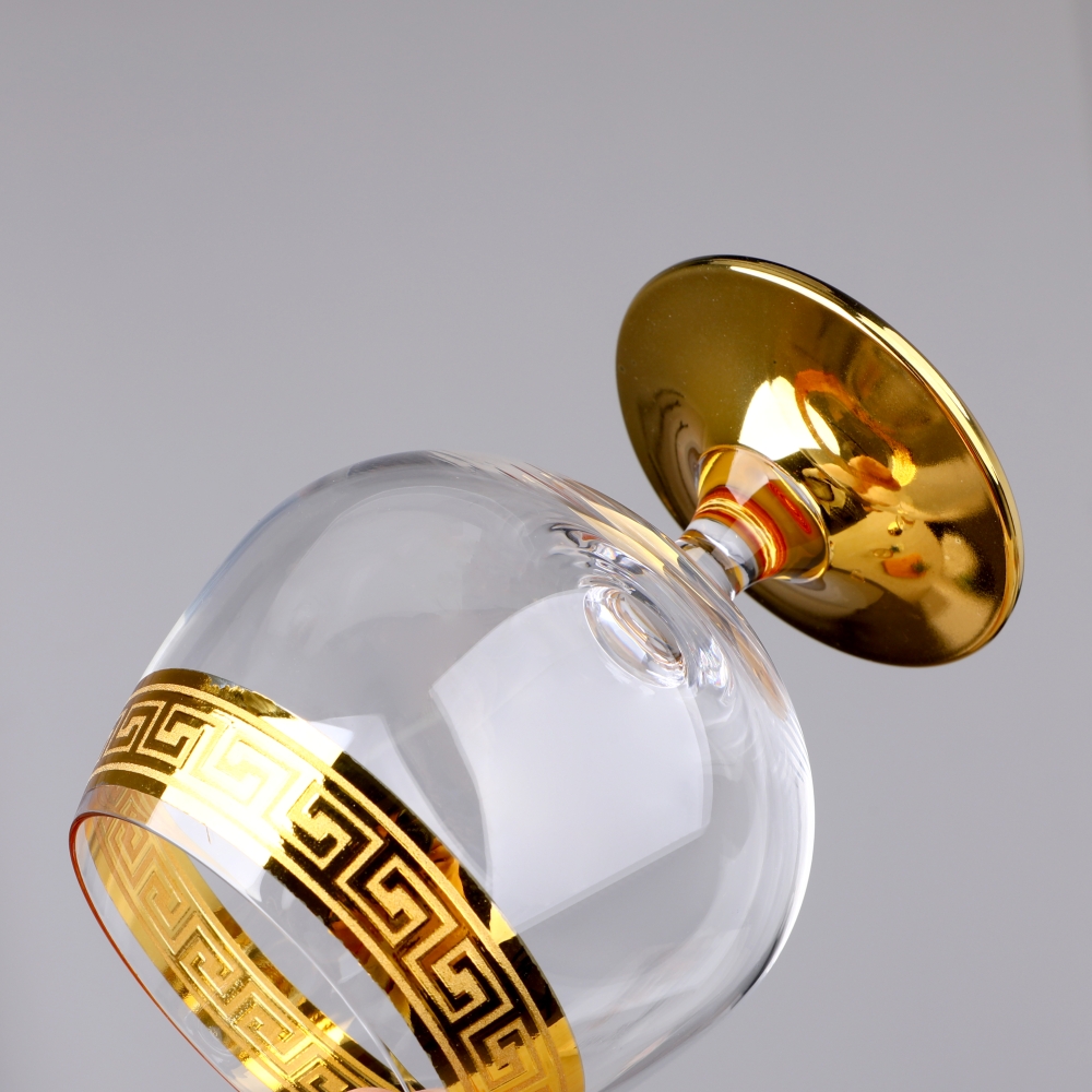 Tall champagne flute with gold band