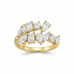 Angled view showing the asymmetrical cluster setting of a multi-shape lab diamond ring in 14k gold, highlighting the prong detailing and mixed stone arrangement.