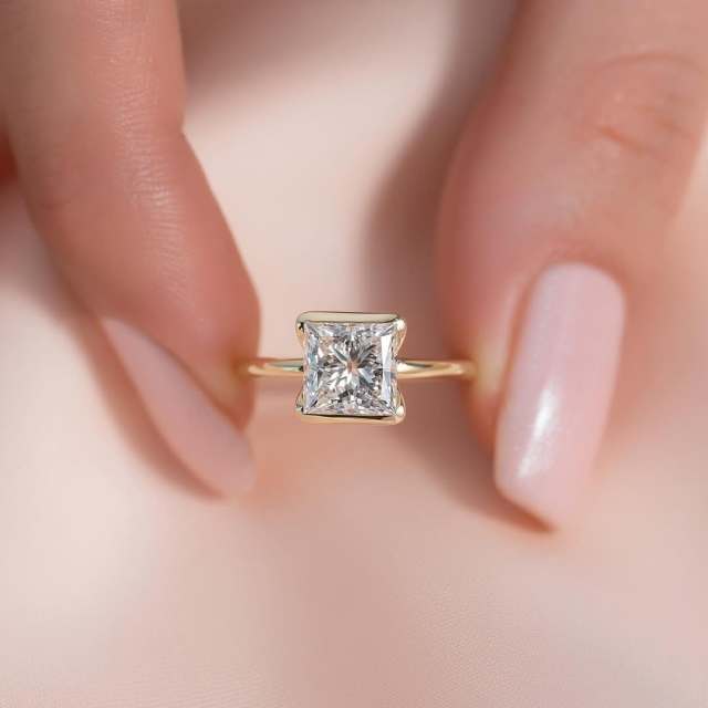 Hand Holding 1 Carat Princess Cut Lab Diamond Promise Ring Showing Size and Sparkle