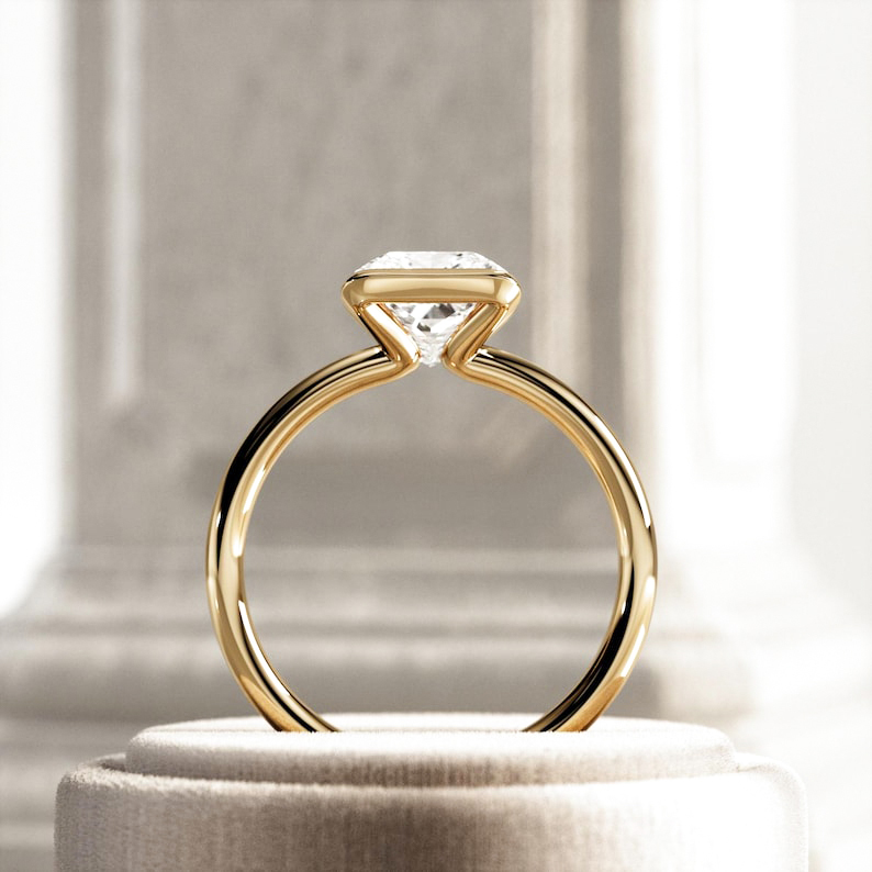 Side Profile of Low Setting Half Bezel Engagement Ring with Open Gallery for Light Return