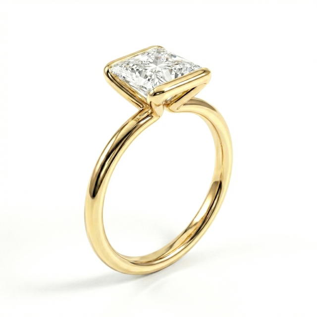 Angled View of Modern Princess Cut Engagement Ring 14K Yellow Gold Half Bezel Design