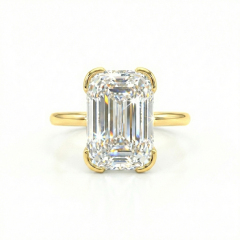 Top view of 3.13ct Ashoka cut lab grown diamond ring. Features 62 facets and elongated shape in 14K gold half-bezel setting.