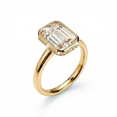 Angled view detailing the hidden halo of round D-F color lab grown diamonds under the bezel head