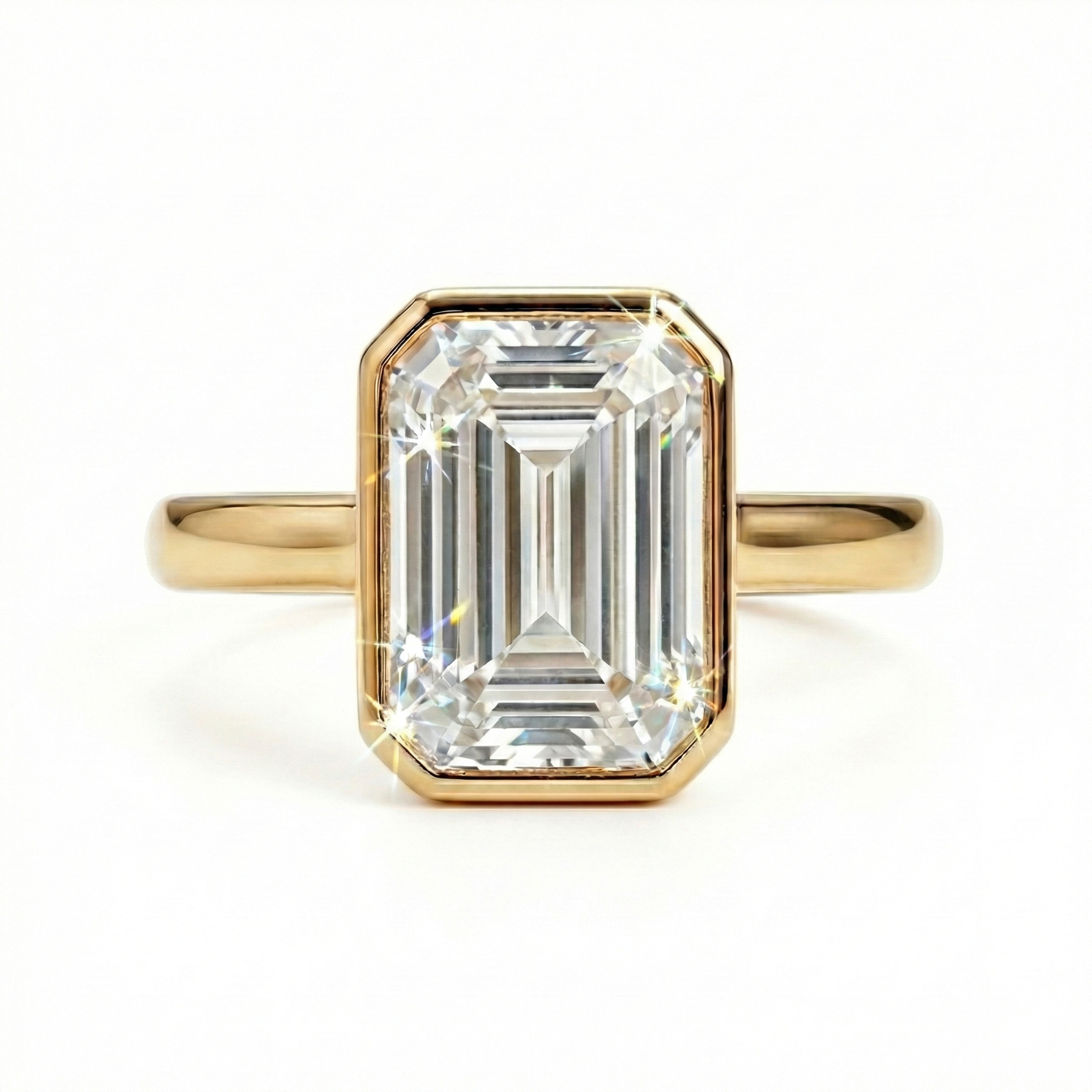 Macro front view of IGI certified E color VVS2 2ct emerald cut lab grown diamond in bezel setting
