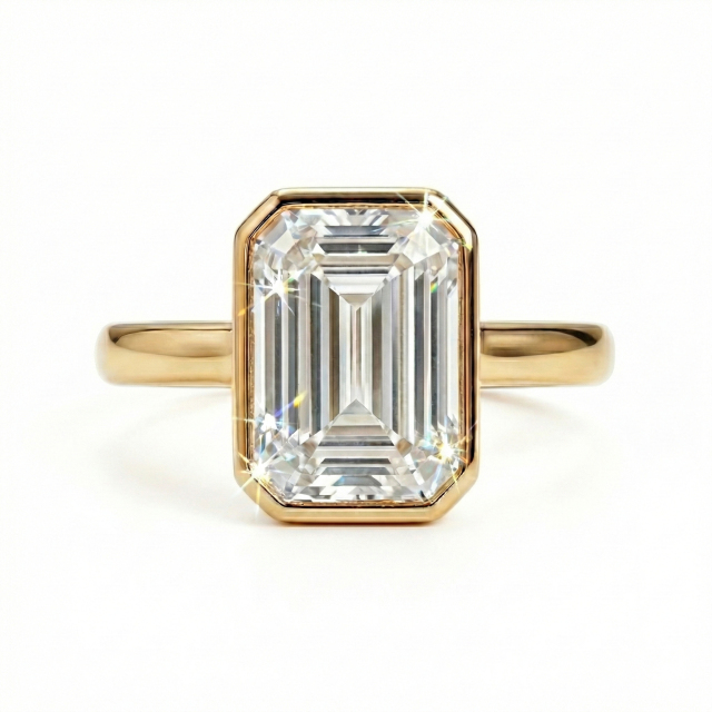 Macro front view of IGI certified E color VVS2 2ct emerald cut lab grown diamond in bezel setting