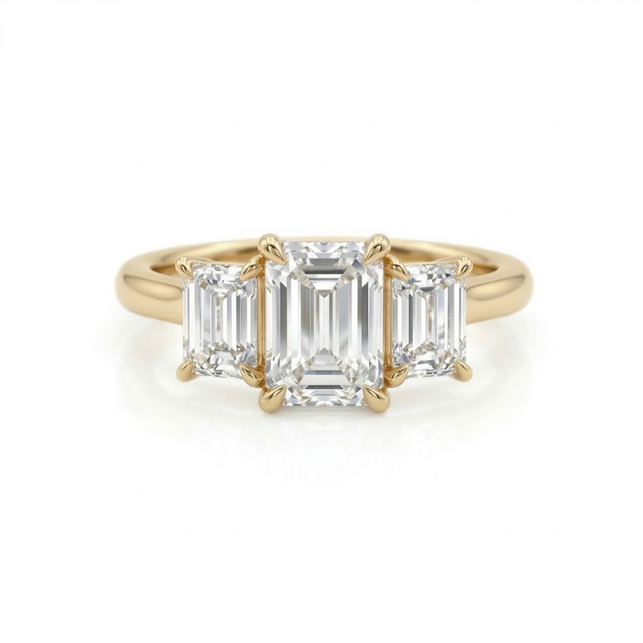 Direct top-down view of an E color VVS2 clarity 2.75 carat emerald cut lab-grown diamond flanked by two emerald cut side stones in 14K gold.