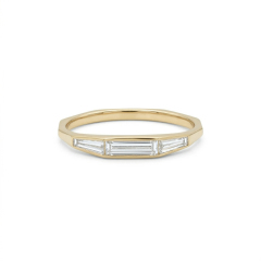 Front view of a 14K gold low profile stackable ring featuring a center straight baguette and side tapered baguette lab diamonds.