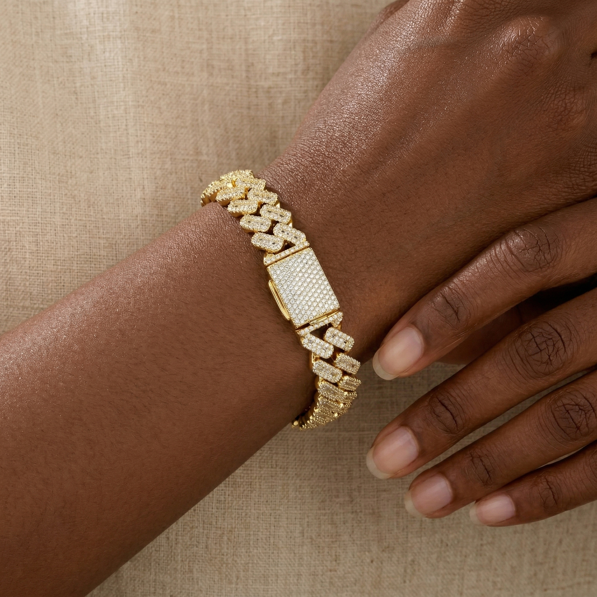 Profile view of the moissanite hip hop bracelet worn on the wrist, revealing the thick rhodium-plated sterling silver foundation and continuous sparkle.