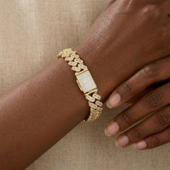 Profile view of the moissanite hip hop bracelet worn on the wrist, revealing the thick rhodium-plated sterling silver foundation and continuous sparkle.