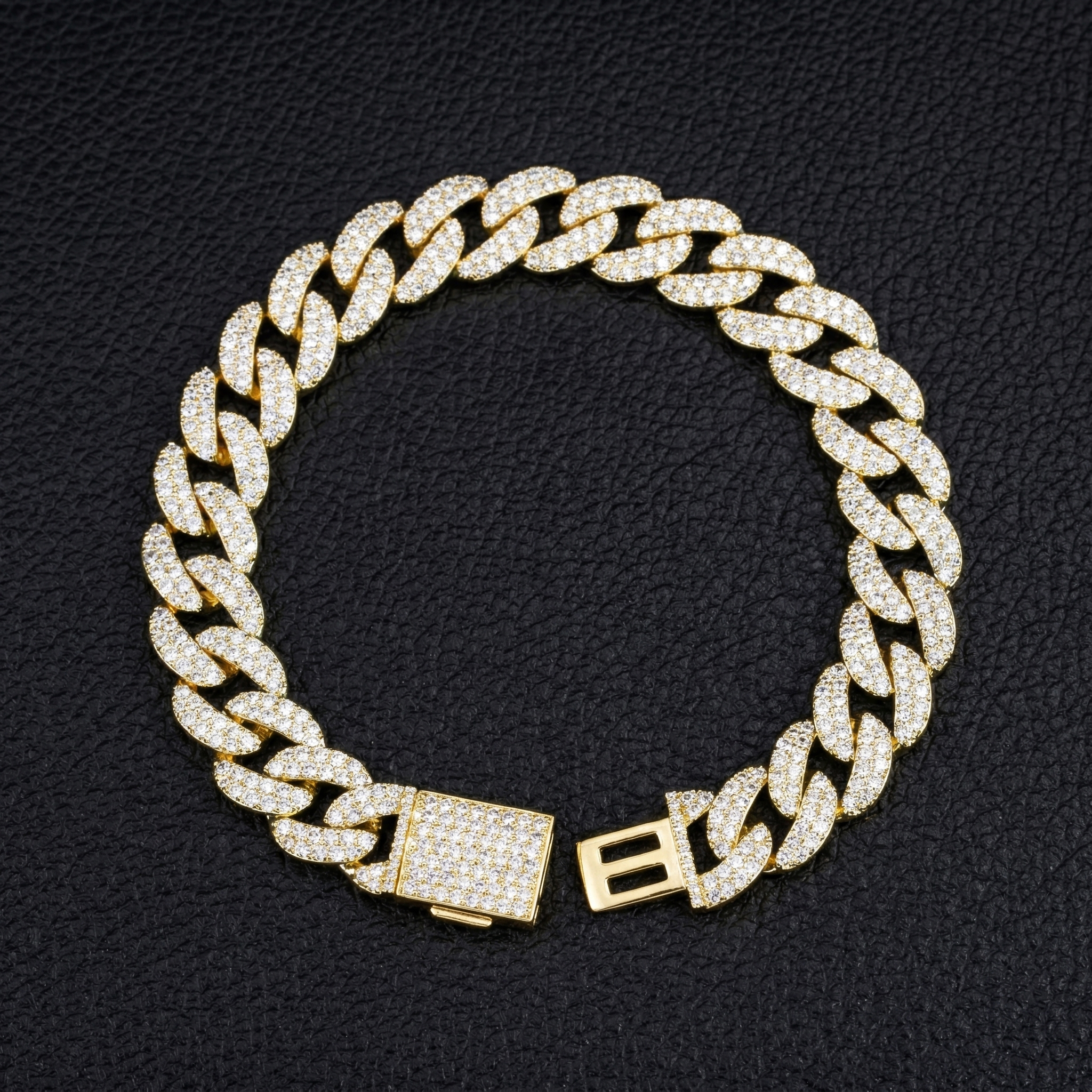 Flat lay top view of a 13mm VVS moissanite Cuban link bracelet in S925 silver with a secure box clasp, fully iced out with D-E color round stones.