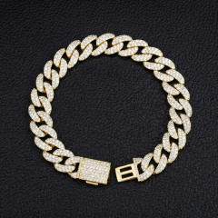 Flat lay top view of a 13mm VVS moissanite Cuban link bracelet in S925 silver with a secure box clasp, fully iced out with D-E color round stones.
